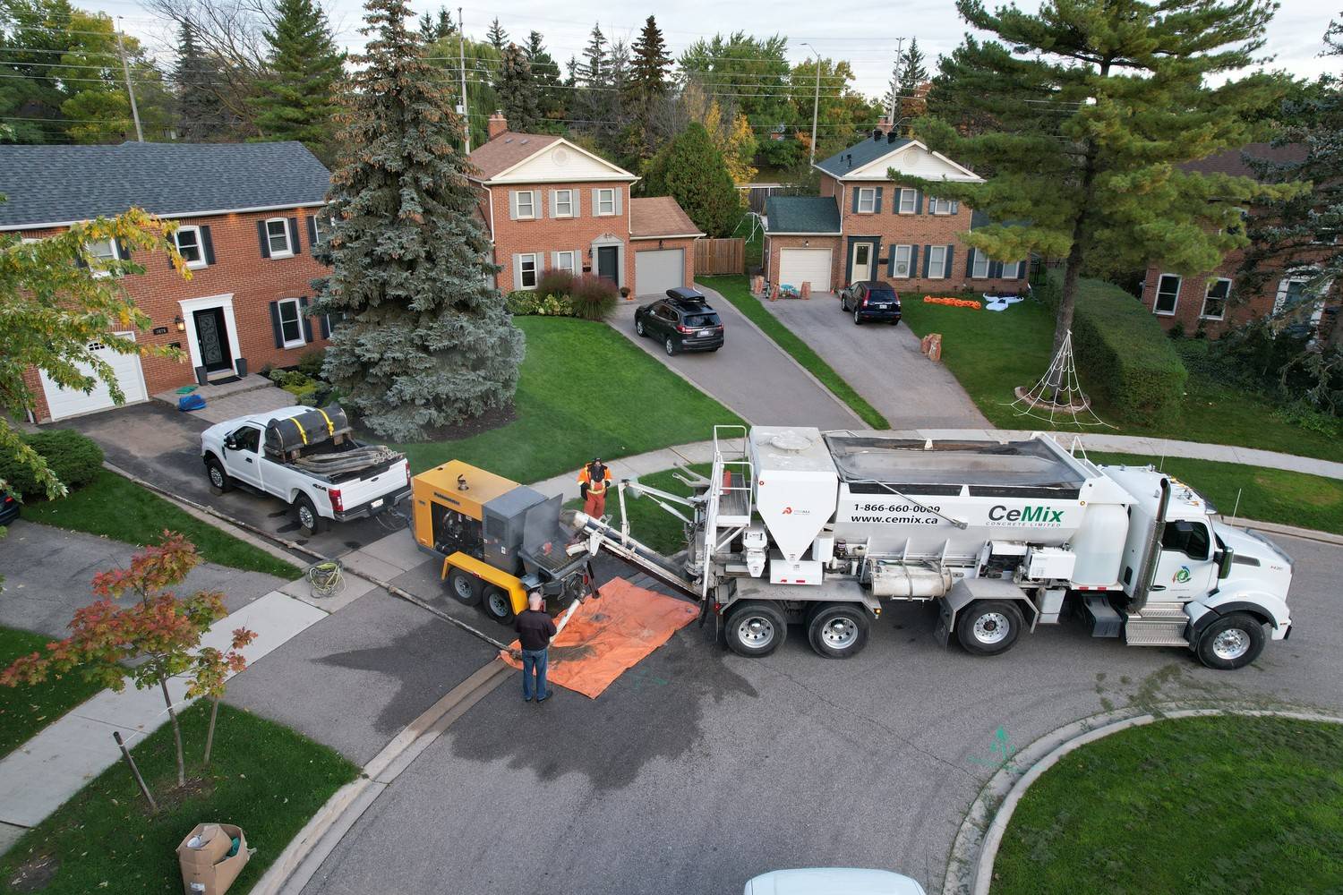 CeMix mobile volumetric concrete mixer truck and pump unit delivering fresh concrete for a residential project in Grimsby ON