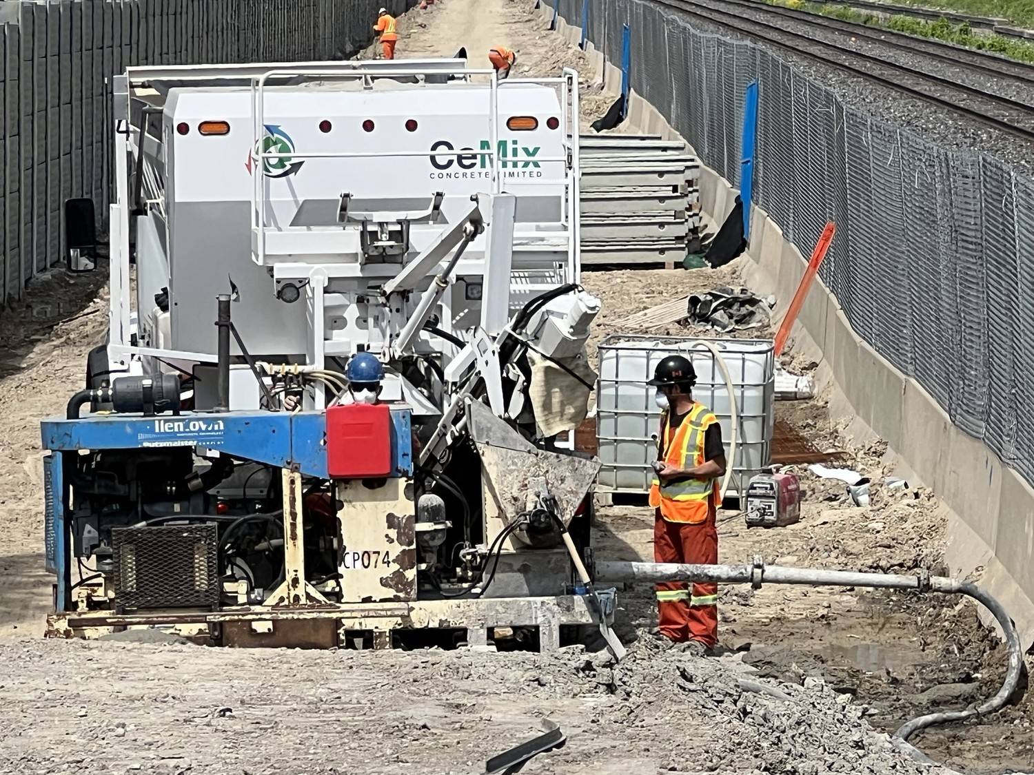 CeMix Concrete Limited volumetric mobile mixer truck supplying fresh concrete on an Ontario infrastructure job site.